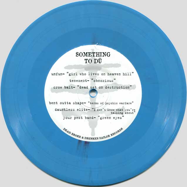 Something To Dü 7" EP A-side (blue vinyl)