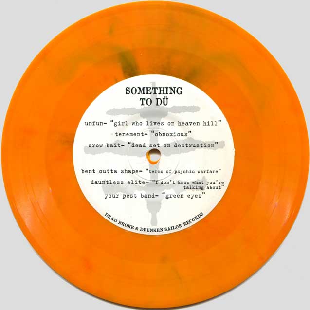 Something To Dü 7" EP A-side (orange vinyl)