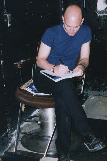 Michael writing, 1st Avenue, Minneapolis MN, 13 Sep 1998